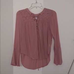 Pink tied long sleeve shirt